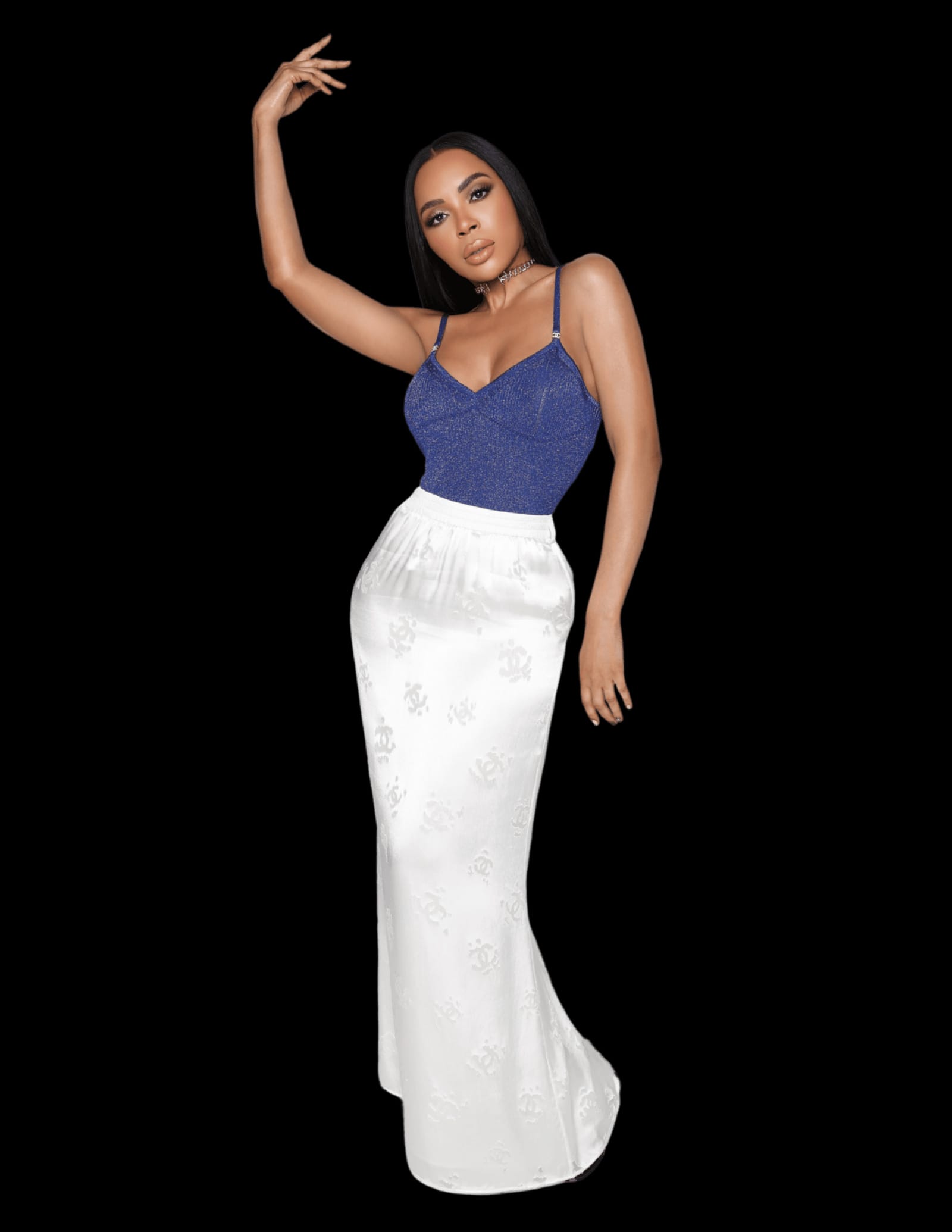 Krista Sher Selico Pop Classical Music Icon in a blue top and long white skirt black background